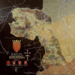 Historische Karte von 1949 zeigt den Kreis Grafschaft Bentheim, umgeben von dunklem Holland, mit Wappen und Stadtsiegeln.